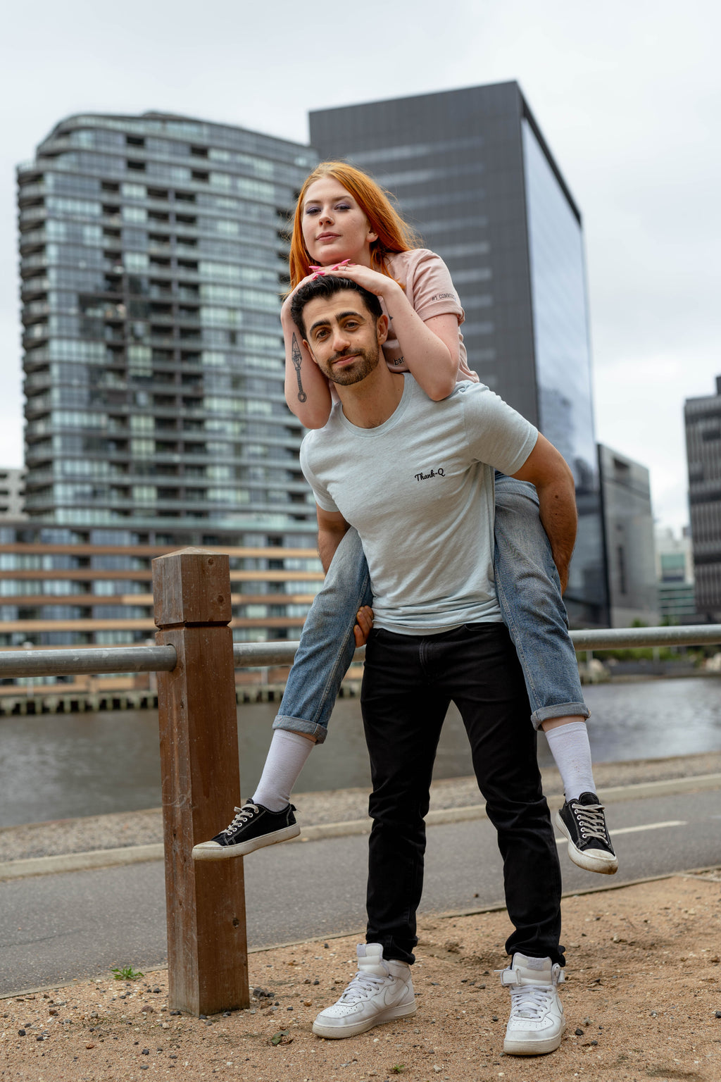 darren and madi piggy back in blue thank-q embroidered tee, banter tee